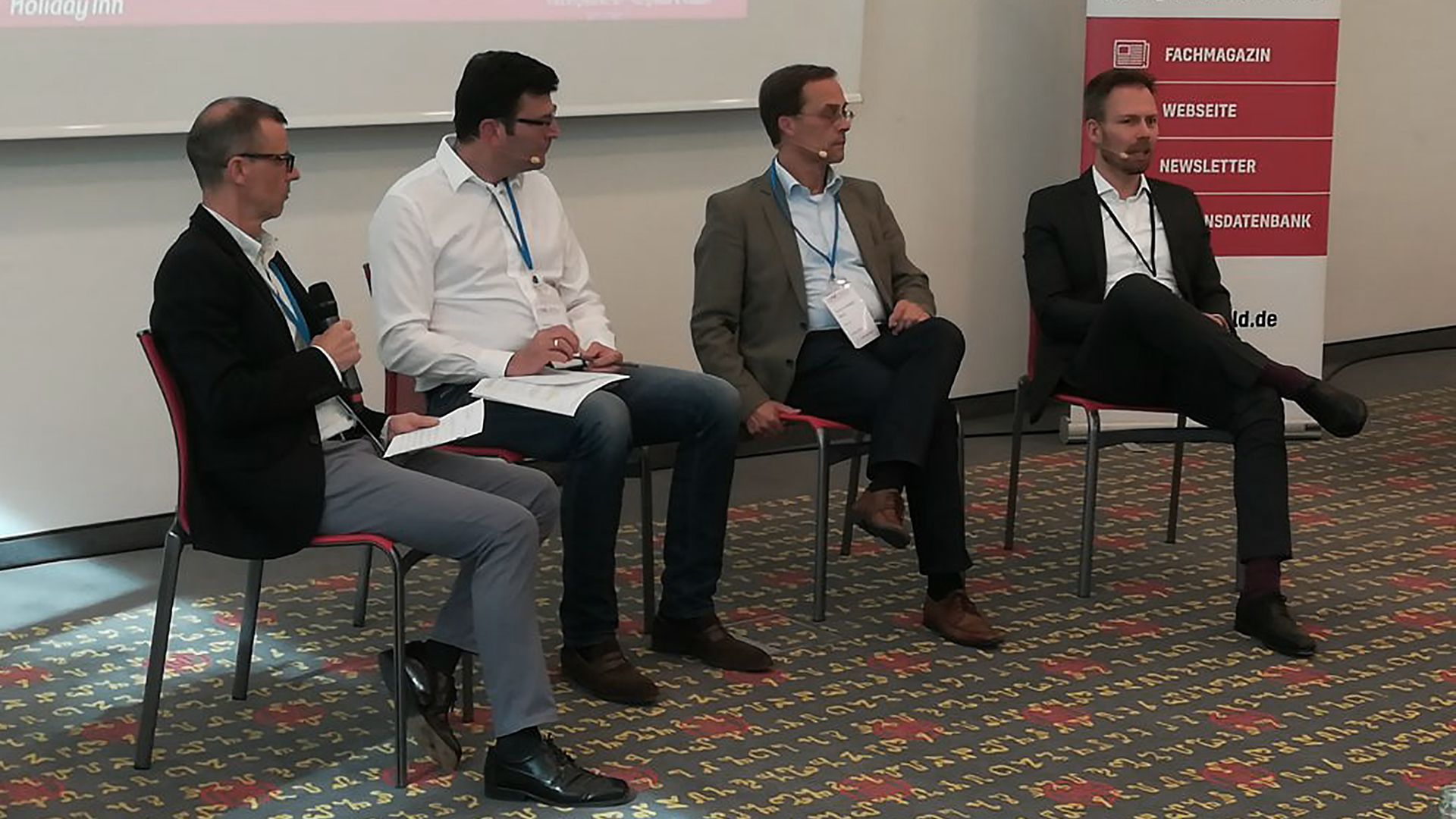 Moderator Helmut van Rinsum, Dariusch Hosseini, Christoph Bauer und Stefan Hanloser (von links)